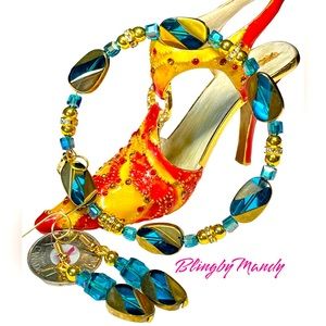 Two piece set blue and gold bracelet and earrings